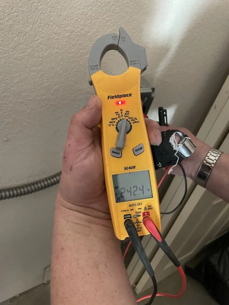 Voltage testing with clamp meter during Generator Installation in Warm Mineral Springs